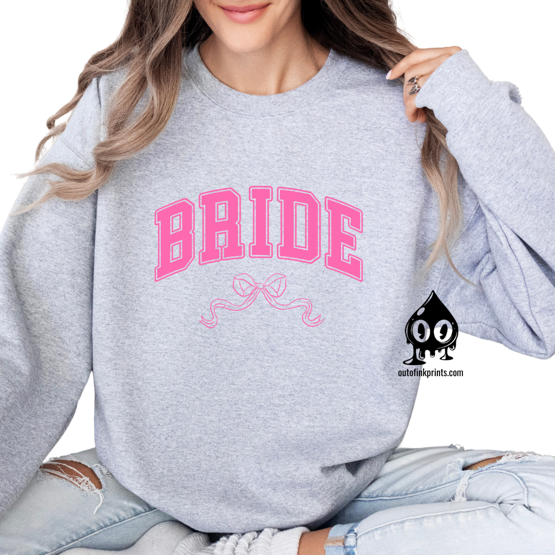 Front View of a Gray sweatshirt with the word 'Bride' and a pink bow on it.
