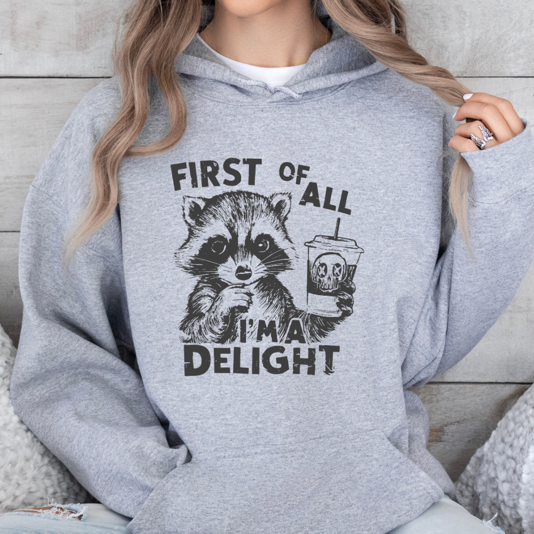 First of All, I'm a Delight" Raccoon – Sassy & Spooky Comfort Hoodie