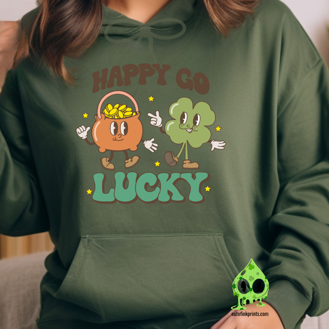 Front view of a green hoodie with the text 'HAPPY GO LUCKY' and a graphic of a leprechaun and a four leaf clover.