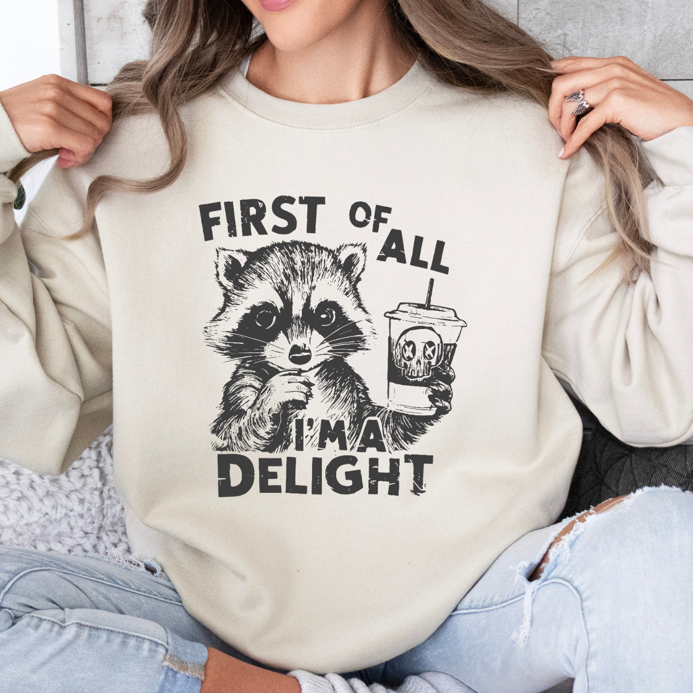 First of All, I'm a Delight" Raccoon – Sassy & Spooky Comfort Sweatshirt