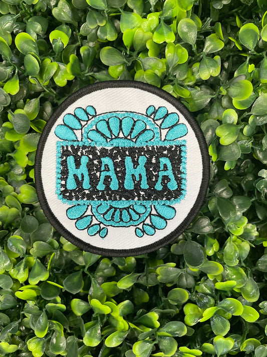 Circular patch with 'MAMA' text on a green leafy background