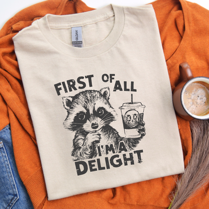 First of All, I'm a Delight" Raccoon – Sassy & Spooky Comfort T-Shirt