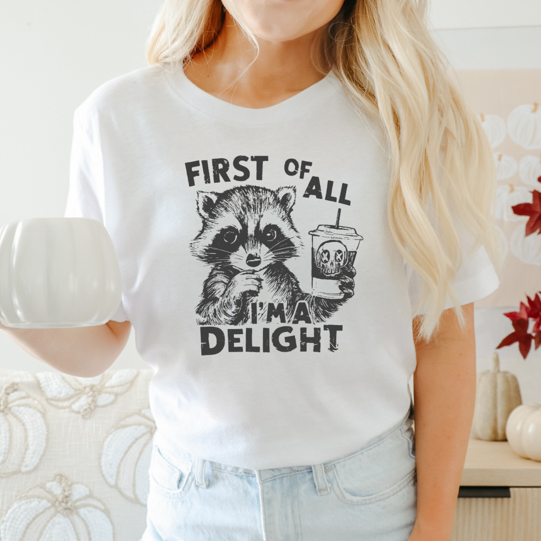 First of All, I'm a Delight" Raccoon – Sassy & Spooky Comfort T-Shirt