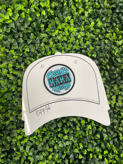 Circular patch with 'MAMA' text placed on a white trucker hat graphic