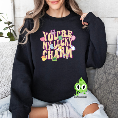 Front view of a black sweatshirt with the text 'YOU'RE MY LUCKY CHARM' printed on the front.