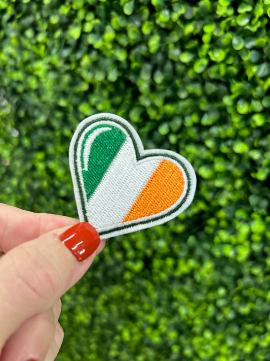 Heart shaped embroidered patch with Ireland flag colors green white and orange.
